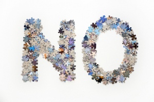 "The word no made from jigsaw puzzle pieces", de Horia Varlan